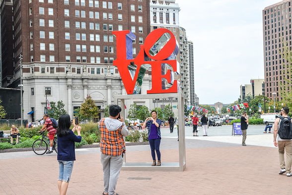 Another popular spot for photos, often of couples, is in front of the Love statue at John F. Kennedy Plaza (a.k.a. Love Park) with the Benjamin Franklin Parkway in the background | 